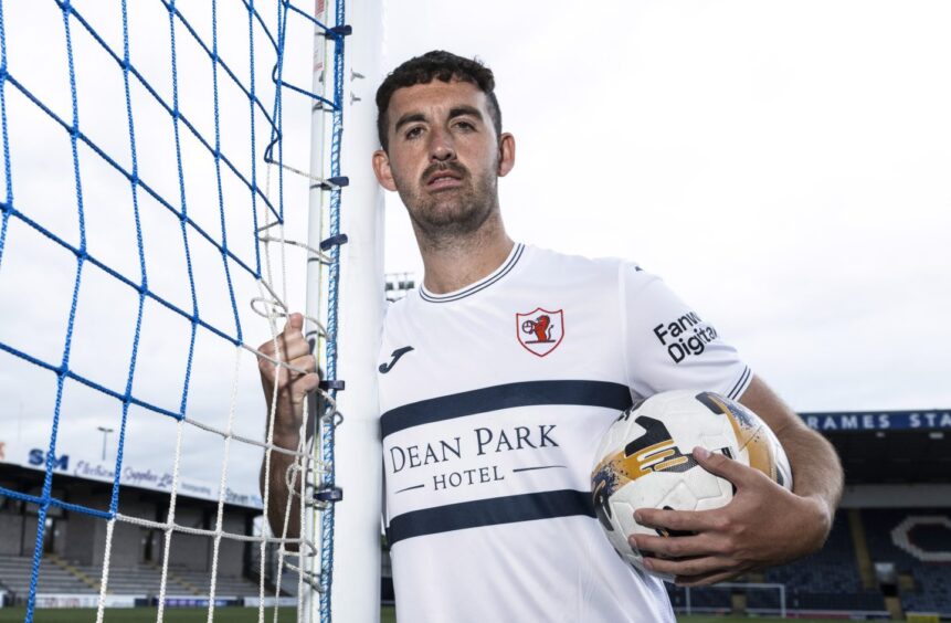 Shaun Byrne stands in a Raith Rovers change kit.