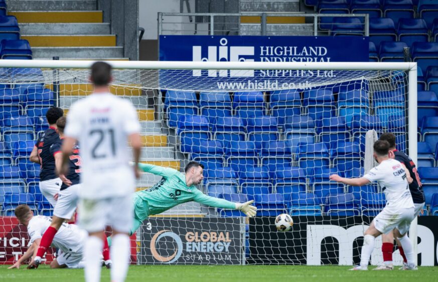 Callum Smith heads in Raith Rovers' equaliser against Ross County.