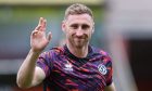 Dundee United's Louis Moult waves to Dundee United fans