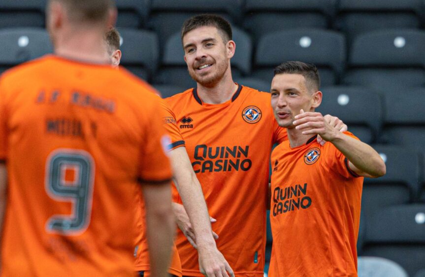 Dundee United players toast David Bubanski's goal against Ayr United