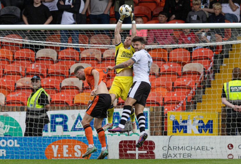 Dundee United's Jack Walton collects a cross against Ayr United