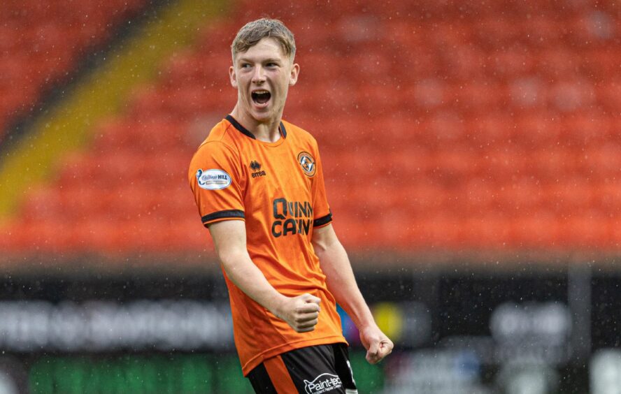 Brandon Forbes roars with delight after finding the net