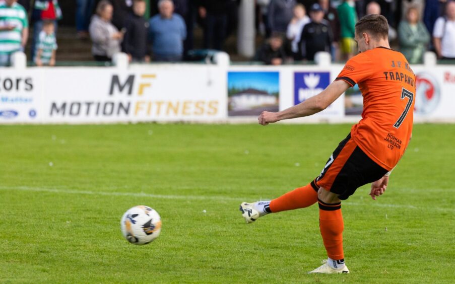 Dundee United's Kristijan Trapanovski slots home his second goal in Scottish football.