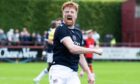 Simon Murray celebrates his first goal as a permanent Dundee player in victory over Annan. Image: SNS