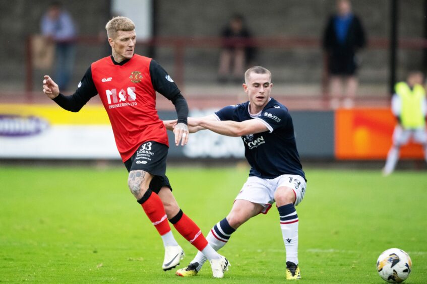 Fin Robertson was used at left wing-back at the start of the season. Image: Paul Devlin/SNS