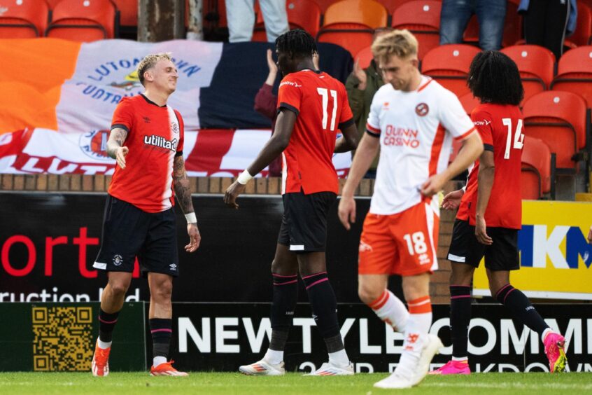 Alfie Doughty celebrates his goal for Luton