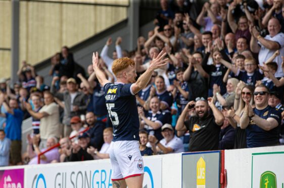 Simon Murray grabbed a hat-trick in front of the Dundee fans at Glebe Park. Image: SNS