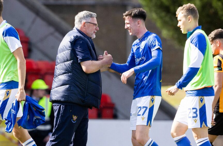 St Johnstone manager Craig Levein with Makenzie Kirk after the young striker scored his first goal in the last League Cup game.