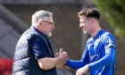 St Johnstone manager Craig Levein with Makenzie Kirk after the young striker scored his first goal in the League Cup game.