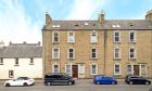 This flat in Broughty Ferry has terrific views from its rooftop balcony. Image: Paul Nelson Photography.
