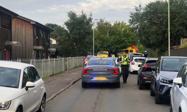 Police search for a motorcyclist after a crash in Linlathen, Dundee.