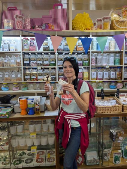 Gayle is like a kid in a candy store when she enters the Star Rock Shop in Kirriemuir. 