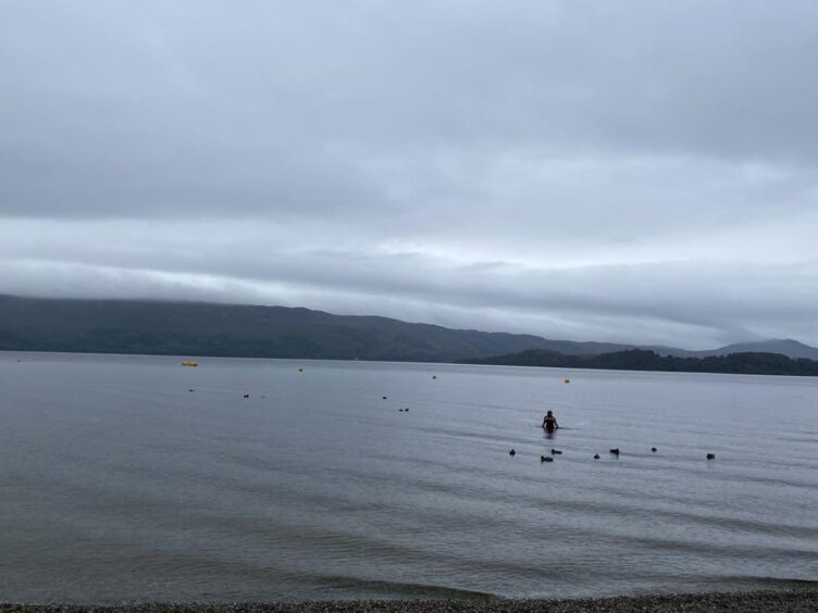 Rebecca swimming on a gloomy summer day at Loch Lomond.