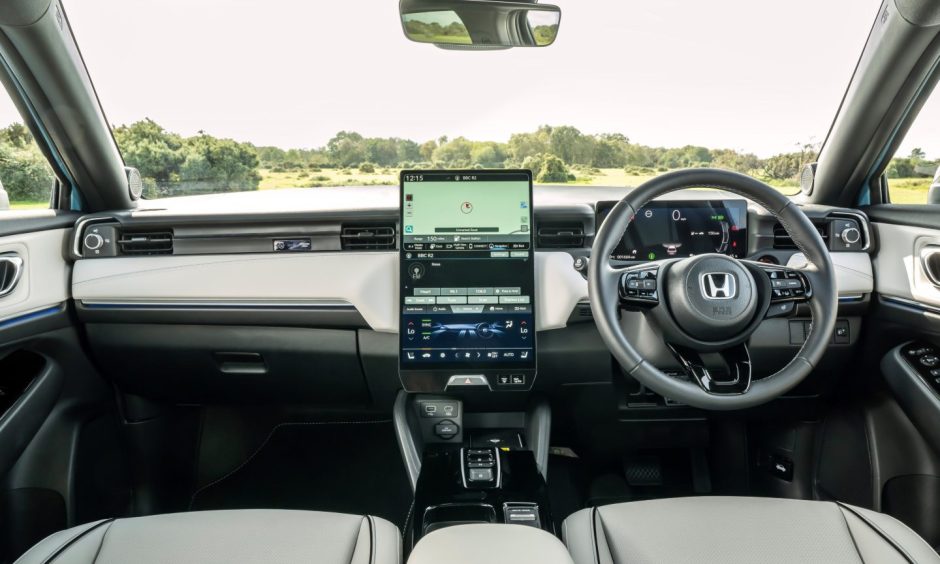 A 15.1in touchscreen dominates the interior. 