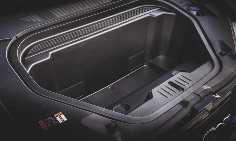 The storage space under the bonnet, which is handy for stowing charge cables. 