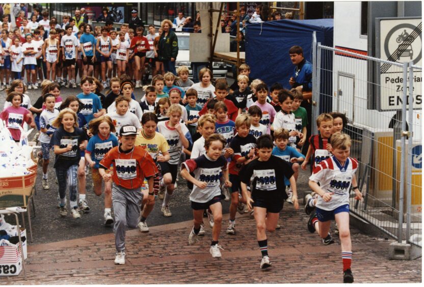 Children taking part in a fun run in Dundee in October 1994. 