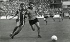 Dundee United's Paul Sturrock hares onto the ball.