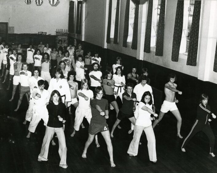 Rows of martial artists in the beginners’ class at Ancrum getting down to some training in October 1974.
