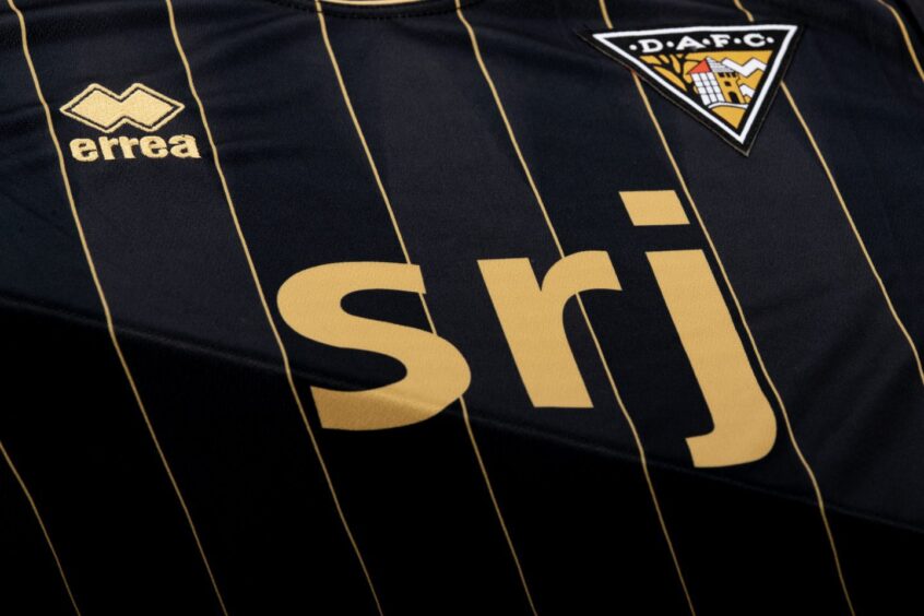 A close up of Dunfermline Athletic FC's new black and gold away kit.