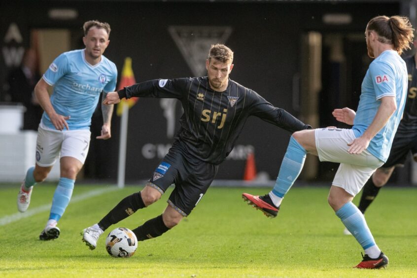 Midfielder David Wotherspoon attacks with the ball at his feet.