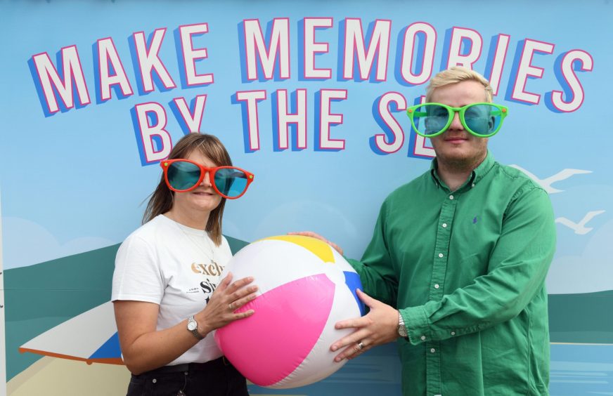 Launch of Leven putting green. Rebecca Moncrieff and Douglas Couper-Fleming hold a beachball