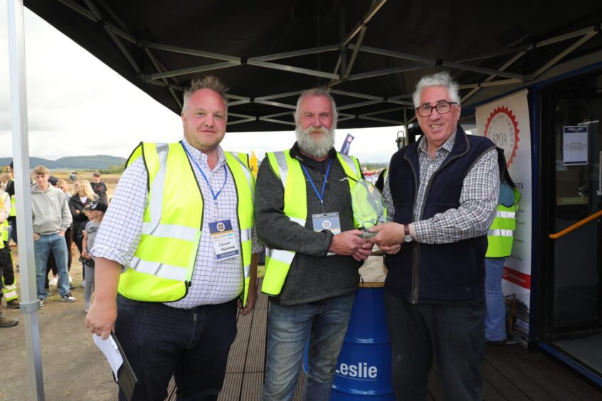 Morris Leslie with two other men at previous vintage machinery event