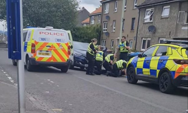 Police on Dunholm Road in Dundee.