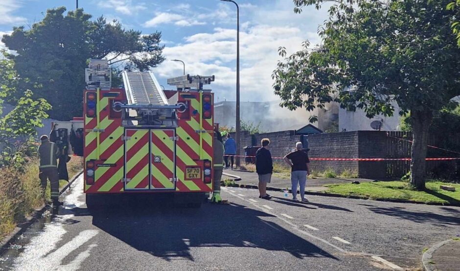 Fire crews tackling house fire in Mid Craigie.