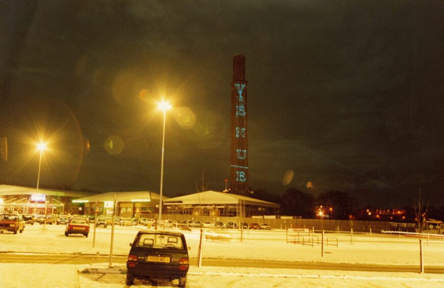 Cox's Stack was used to project a sign for The Venue nightclub in 1991. The word Venue can be seen in blue letters on the chimney