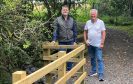 Athole McDonald and Craigie Hill Golf Club’s past captain Paul Fagan next to new fence on Buckie Braes path, Perth