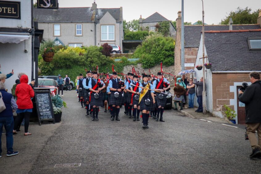 Lathallan School pipe band march through Johnshaven.