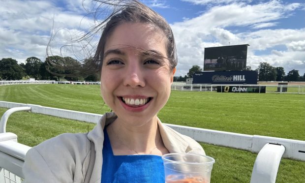 Writer Poppy Watson pictured at the race track.