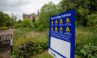 Water safety notice beside dried out pond at Norie-MIller walk, Perth