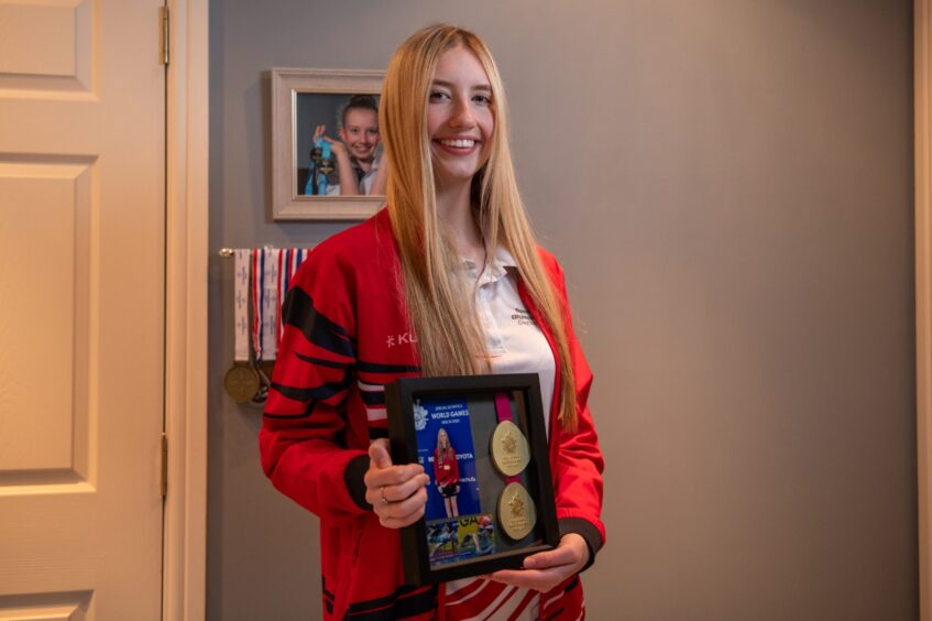 Taylor with her medals.