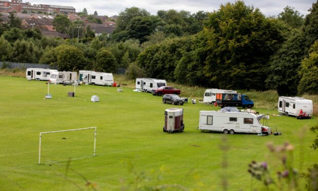 Travellers at Drumgeith football pitches last year. Image: Kenny Smith/DC Thomson.