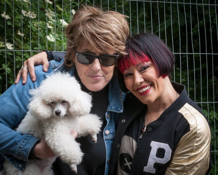 Katrina with her pet poodle and Republica frontwoman Saffron Sprackling.