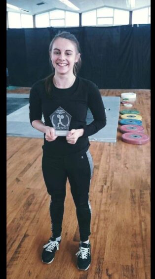  Kayleigh with her award for Olympic Weightlifting in 2016. 