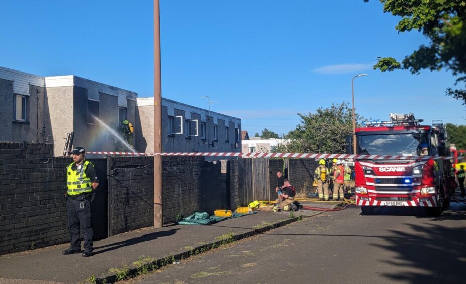 Firefighters at the scene on Linfield Street in Dundee.