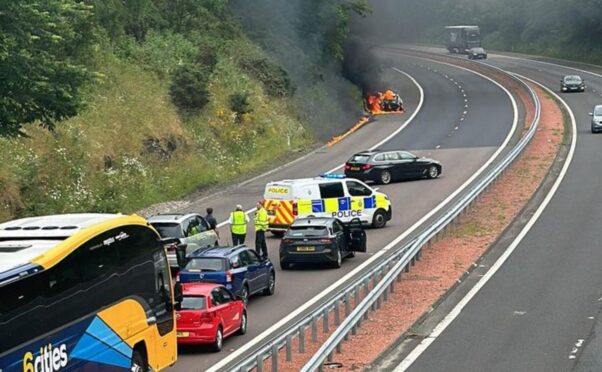 Car fire has blocked the M90 at Glenfarg.