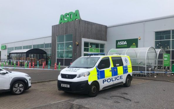 To go with story by Bryan Copland. Asda in Arbroath taped off by police Picture shows; Asda in Arbroath taped off by police. Asda, Arbroath. Supplied by James Simpson/DC Thomson Date; 01/07/2024
