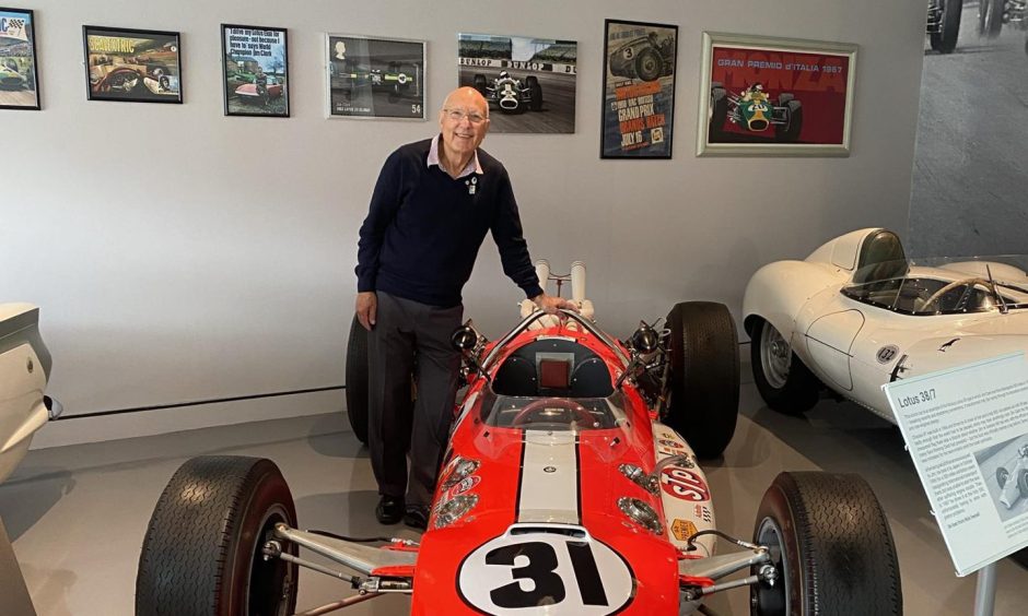 Former F1 mechanic Derek Wild with the Lotus 38/7 at the Jim Clark Museum.