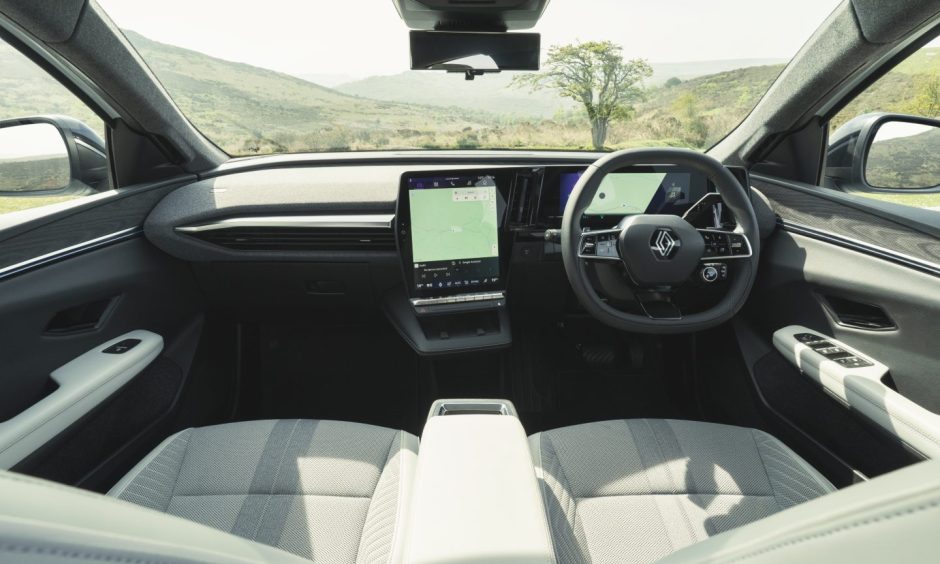 The front two seats and dashboard of the Renault Scenic E-Tech