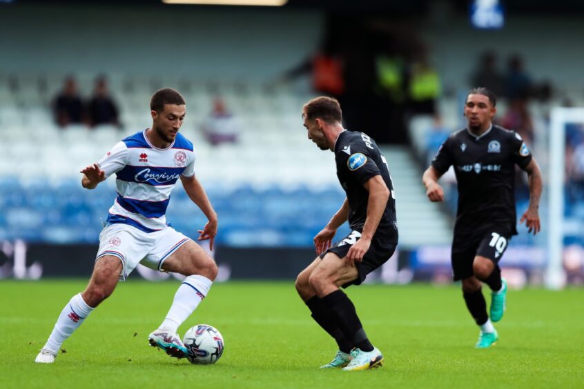 Ziyad Larkeche takes on Blackburn Rovers. Image: PA