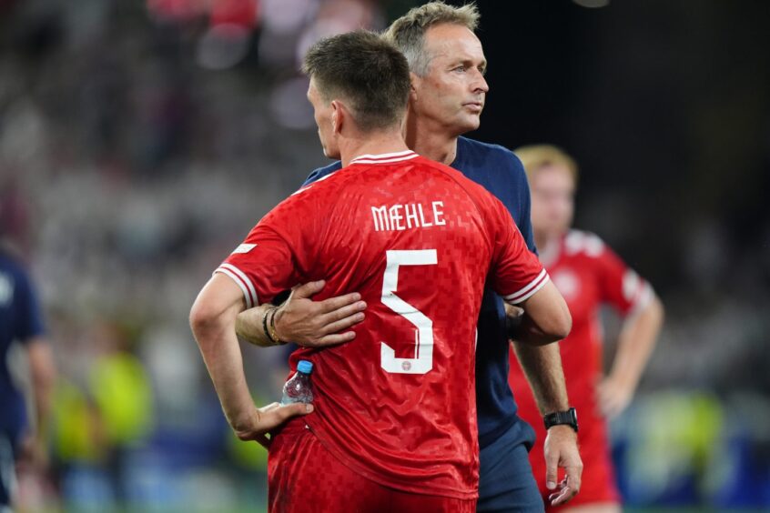 Denmark manager Kasper Hjulmand (right) and Joakim Maehle react at full-time after losing the UEFA Euro 2024 round of 16 match at the BVB Stadion Dortmund in Dortmund, Germany. Picture date: Saturday June 29, 2024.