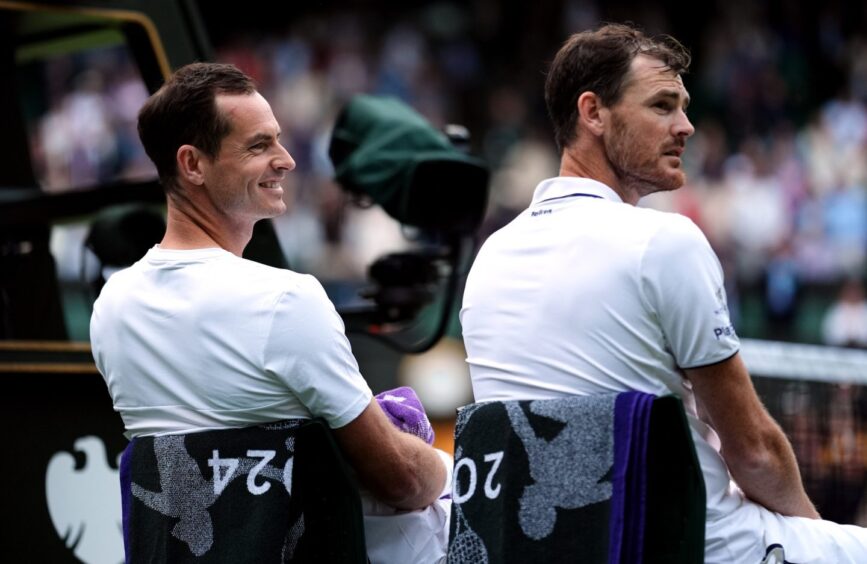 Andy Murray and Jamie Murray following the gentlemen's doubles match against Rinky Hijikata and John Peers on day four of the 2024 Wimbledon Championships at the All England Lawn Tennis and Croquet Club, London. Picture date: Thursday July 4, 2024.