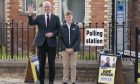 First Minister John Swinney with his son Matthew. Image: PA.