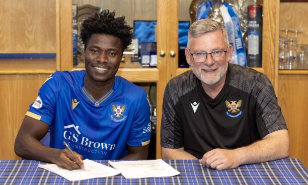 Aaron Essel pictured with manager Craig Levein after signing for St Johnstone.