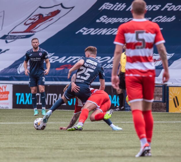 Raith Rovers' Kai Montagu shields the ball from a Hamilton Accies defender.