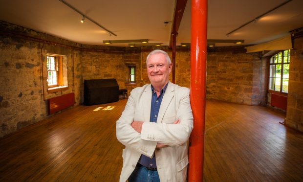 CR0049170 - Rebecca Baird Story - Angus area - Alan Steadman, voice of the Speaking Clock, as he celebrates 35 years of jazz at Hospitalfield with a lookback in the room where every single one of the concerts has taken place - Picture shows Alan Steadman - Hospitalfield House, Hospitalfield, Arbroath -- Friday 19th July 2024 
Image: Steve MacDougall/DC Thomson