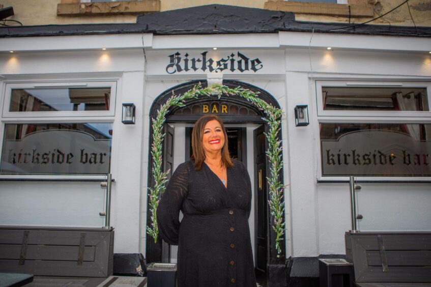 Kirsty Robertson smiling outside Kirkside Bar